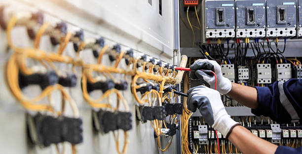 Professional Electrician technician working in Piney Point Village, TX
